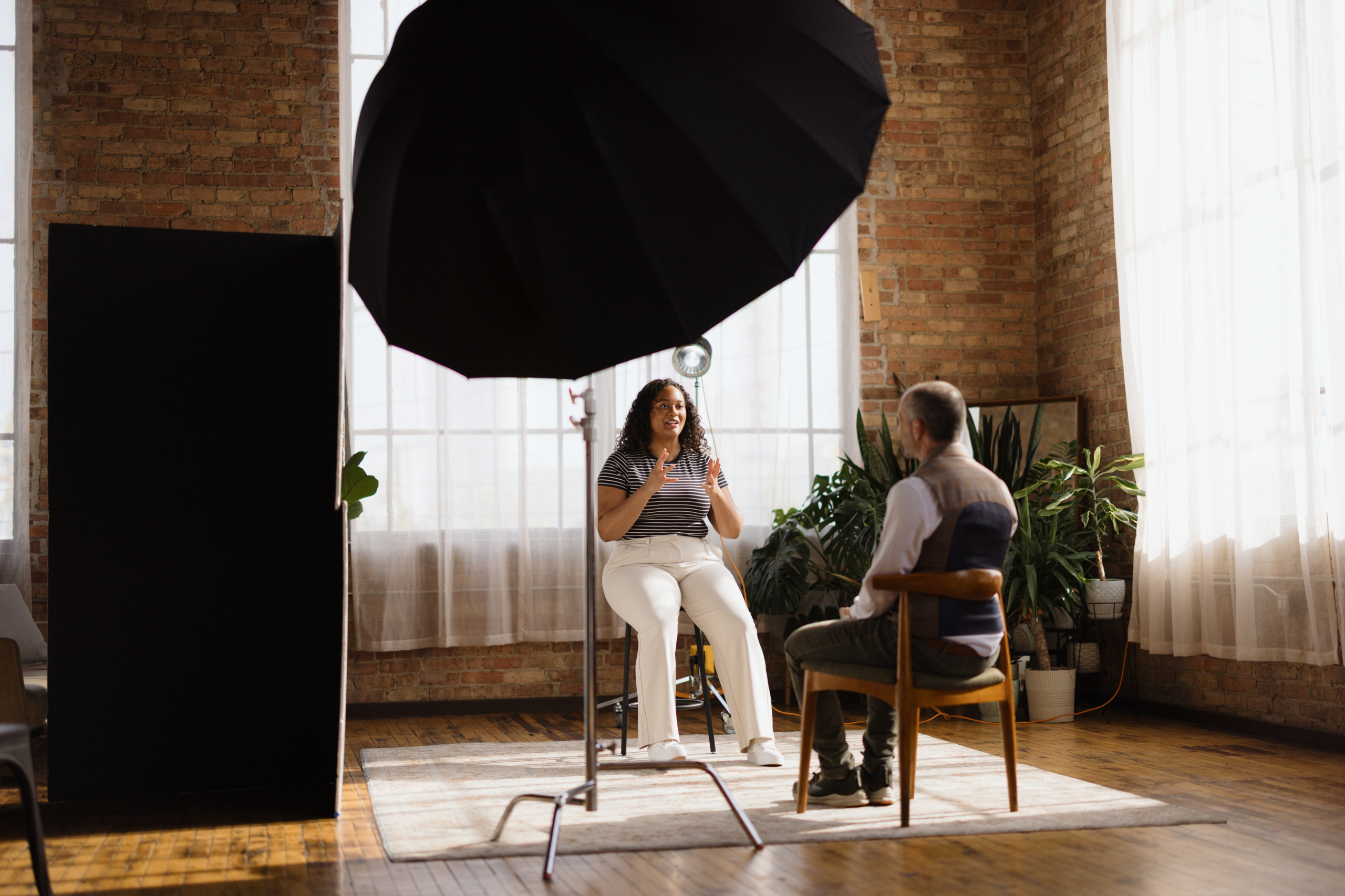 Content creator recording a podcast in a loft studio